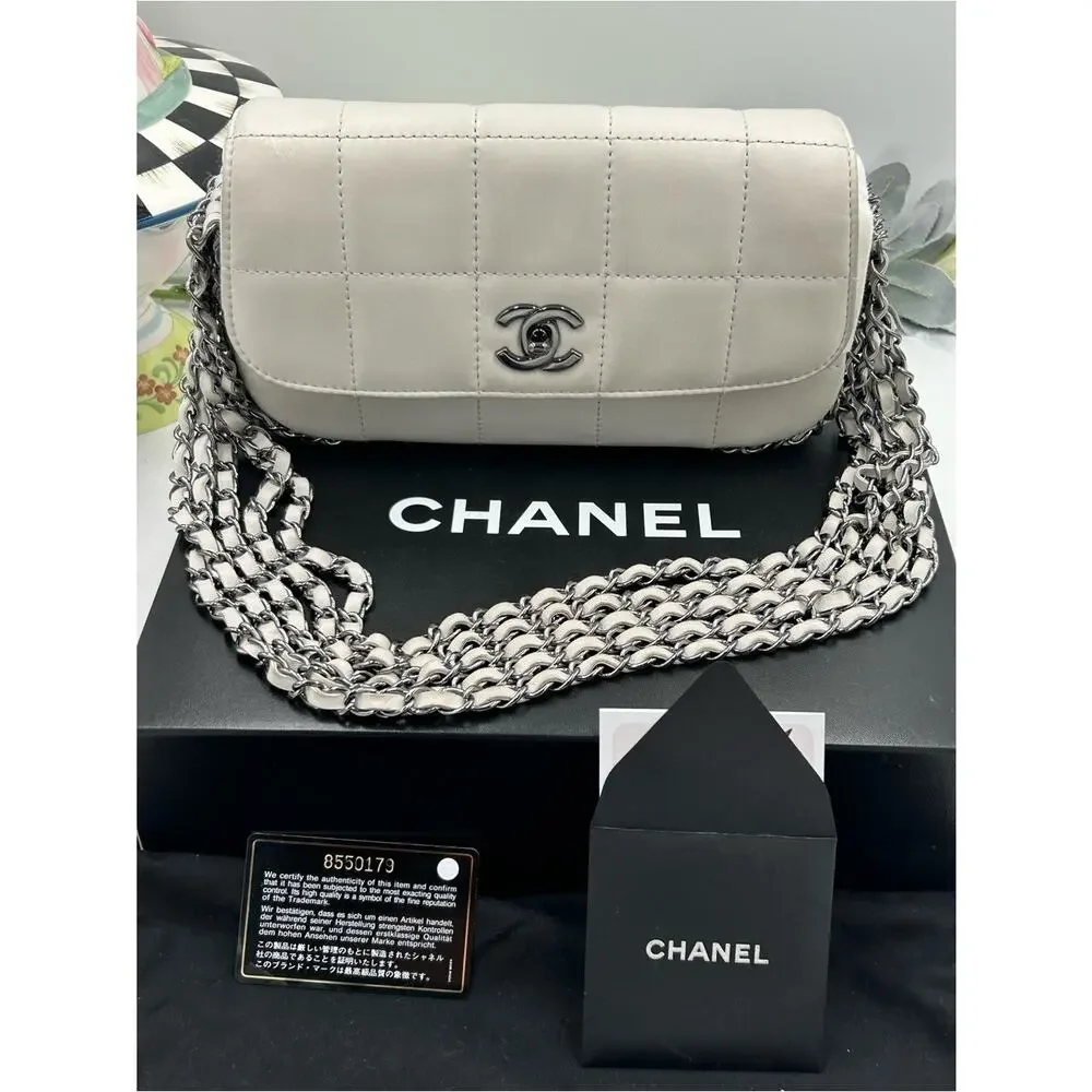 Women's vintage Chanel multi chain quilted flap bag made in Italy PRISTINE